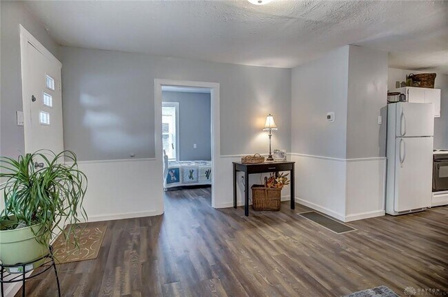 Living room looking into bedroom/study - 2745 Gladstone St