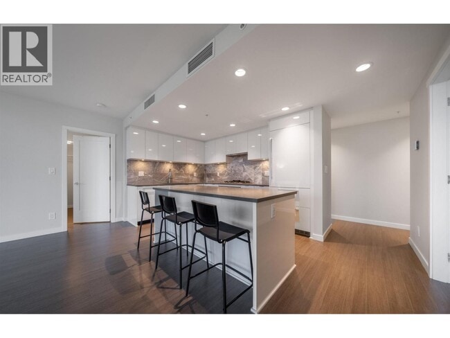 Building Photo - 3699 Sexsmith Rd