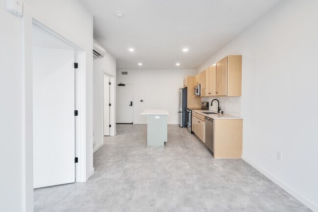 1 Bedroom Model A12 Kitchen & Living Room - The Common Place