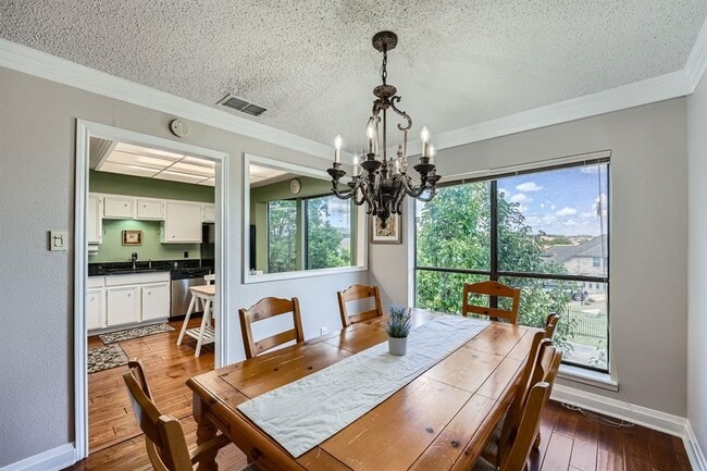 Building Photo - 204 World of Tennis Sq