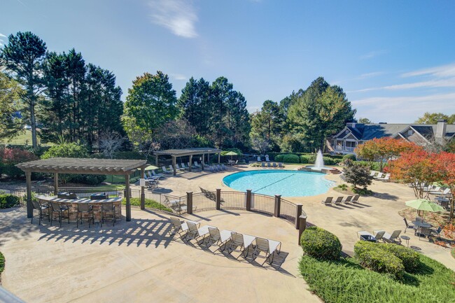 Sparkling Pool Area and Sundeck - The Residences on McGinnis Ferry Apartments