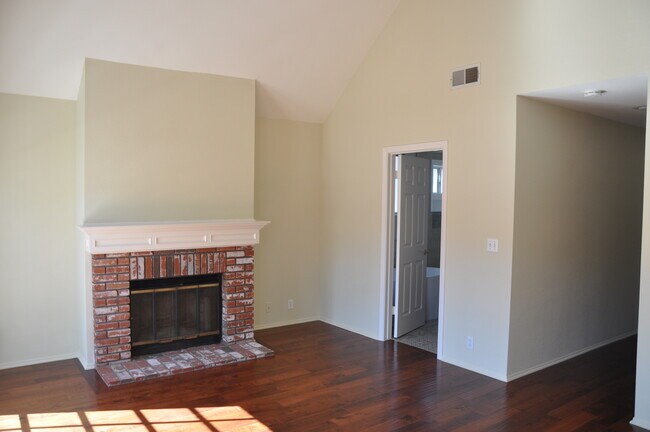 Primary bedroom with fireplace - 1713 Goodman Ave
