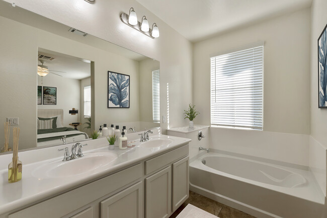 Dual sink vanity in master bathroom with soaking tub - Casa Sole Vita Townhomes