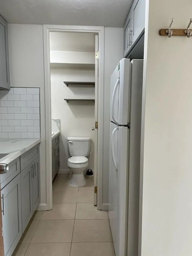 Building Photo - High-Floor Studio Featuring Full Kitchen, Parking & Brilliant Views at The Five Regents
