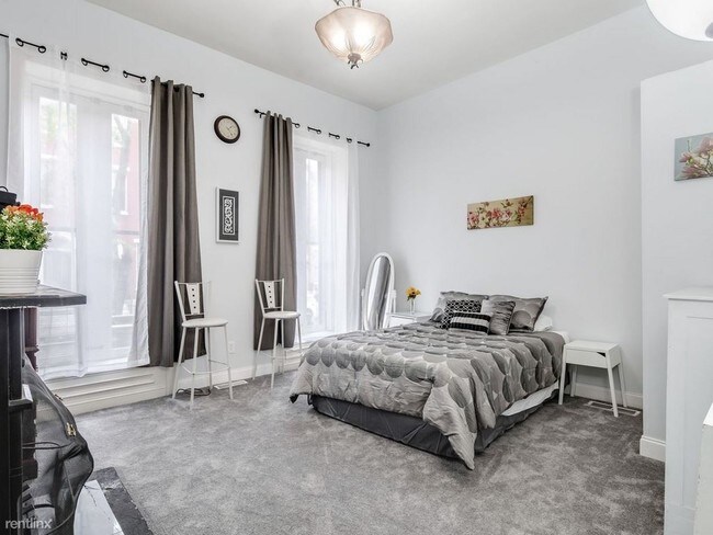 Building Photo - 2 br, 2 bath Condo - 6280 W 3rd St Apt 411