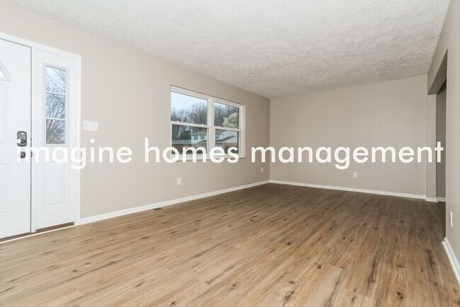 Building Photo - 1409 Hilltree Drive