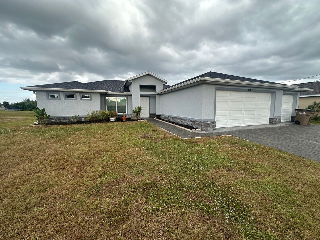 Primary Photo - NE Cape Coral- Gator Circle Home- 4 Bedroom 2 Bathrooms 3 Car Garage