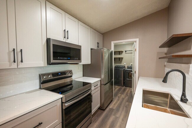 Newly Remodeled Kitchen & Attached Laundry Room - 8892 Eagleview Dr