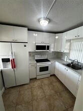 Building Photo - 6565 W 26th Dr