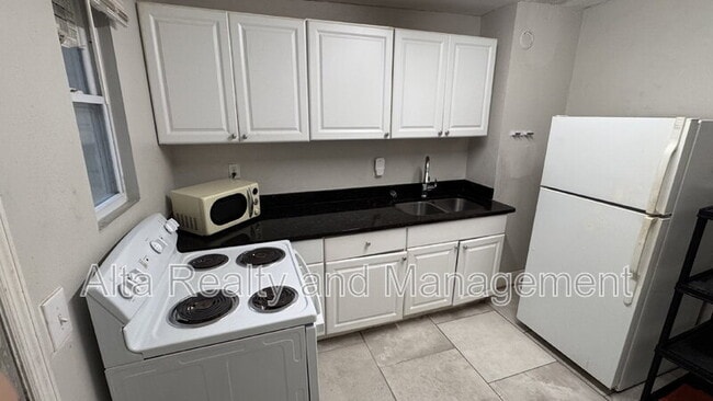 Photo - 1245 W 30th St Apartment