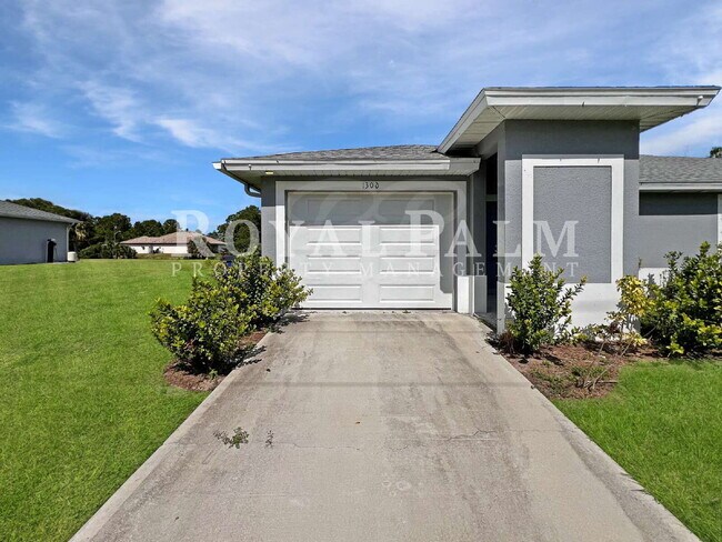 Building Photo - Move-In Special! Half Month FREE – APPLY by December 15th – Modern 3BR/2BA Duplex in Lehigh Acres...