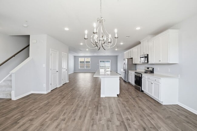 Building Photo - Experience refined, contemporary living in this nearly new residence designed for both comfort an...