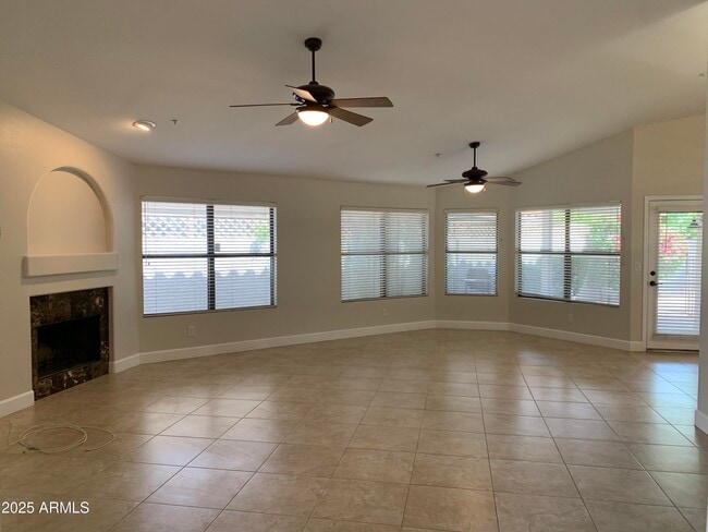 Building Photo - 8889 E Aster Dr