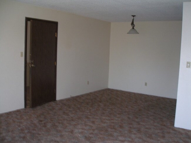 Sala de estar/comedor - Acres Apartments
