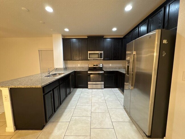 Foto del edificio - 9701 Kinmore Dr