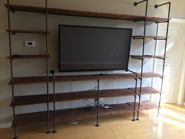 Custom shelving with 60" TV (can be left in unit) - 821 Ralph McGill Blvd NE