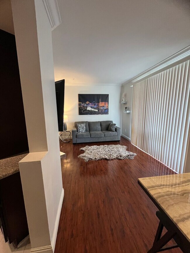 Building Photo - Meridian  Fully FURNISHED Condo with Strip...