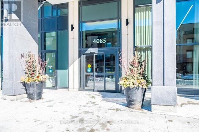 Photo du bâtiment - 4085-4085 Parkside Village Dr