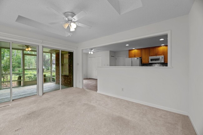 Building Photo - Live Where Others Vacation | Gated Community + Marina Access