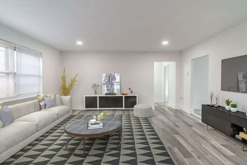Sala de estar - Tall Tree Village Apartments