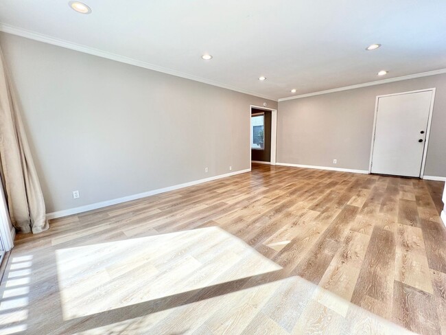 Building Photo - Contemporary 2 Bed Condo with 2 Garage Parking Spaces, Community Pool, and 3 Private Balconies