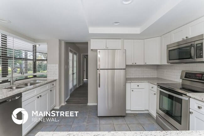 Building Photo - 8055 Wooden Dr