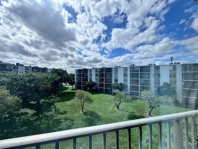 Building Photo - 8740 N Sherman Cir