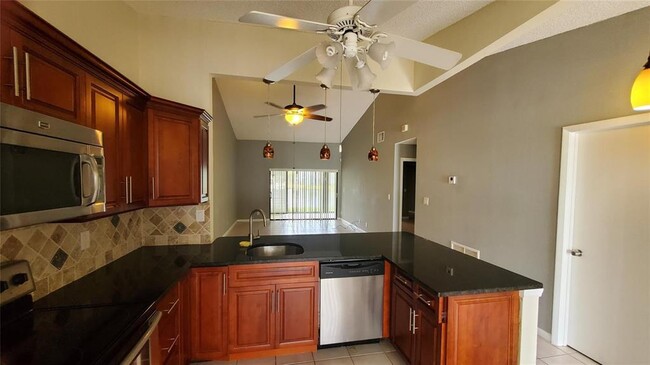 Building Photo - 3853 Carambola Cir N
