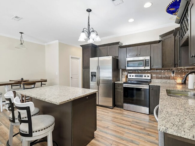 Building Photo - Walk to Lebanon Square | Updated 3-Bedroom Townhome with Fenced Yard