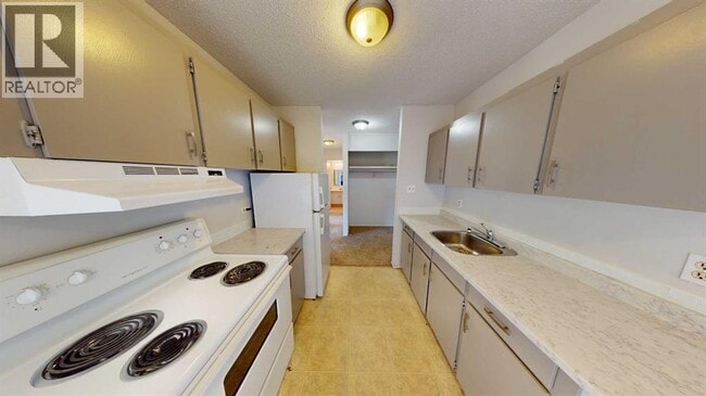 Photo du bâtiment - 10505-10103 103 St