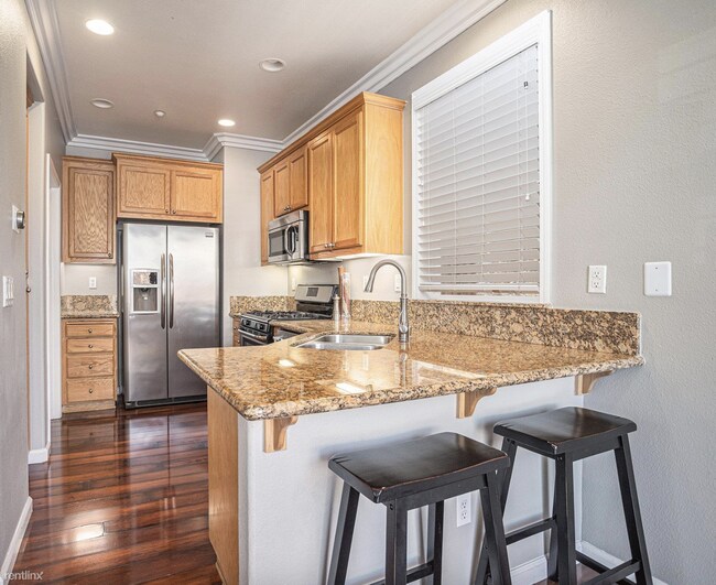 Building Photo - 3 br, 2.5 bath House - 6060 Autumn Leaf Co...