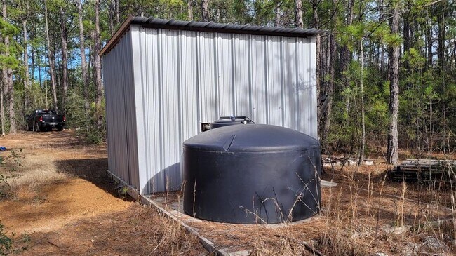 Building Photo - 9855 Hidden Acres Dr
