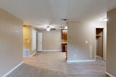 Located at 10741 Fair Oaks Blvd in Fair Oaks, CA, this one-bedroom, one-bathroom unit offers a practical and efficiently designed single-floor layout. The open living area features a combination of light wood-style flooring and plush carpet, creating a comfortable and cohesive atmosphere throughout. A ceiling fan adds both style and function to the main living space.

The kitchen is a standout feature, equipped with rich dark wood cabinetry, granite-style countertops, and stainless steel appliances including a gas range, dishwasher, and refrigerator. A window provides natural light, making the kitchen feel bright and functional. The layout flows naturally from the kitchen into the living area.

The bedroom offers a well-proportioned, carpeted space with a window that lets in natural light and views of the surrounding area. A door connects directly to the bathroom, providing added convenience.

The bathroom is finished with a granite-topped vanity featuring dark wood cabinetry, a full tub-shower combo with brushed nickel fixtures, and light wood-style flooring that ties in with the rest of the unit.

Neutral, warm-toned walls throughout the unit contribute to a clean and inviting ambiance, making this a functional and comfortable space in Fair Oaks, California.