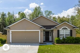 Building Photo - 7104 Rapid River Dr W