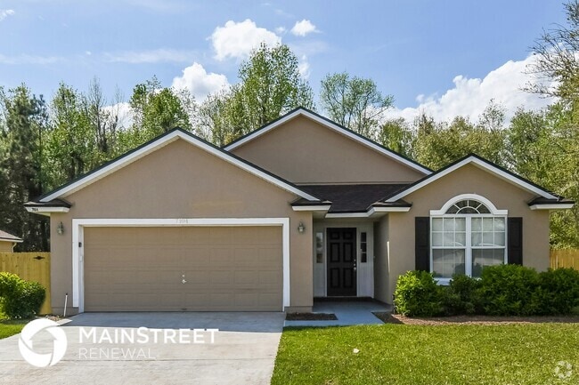 Building Photo - 7104 Rapid River Dr W