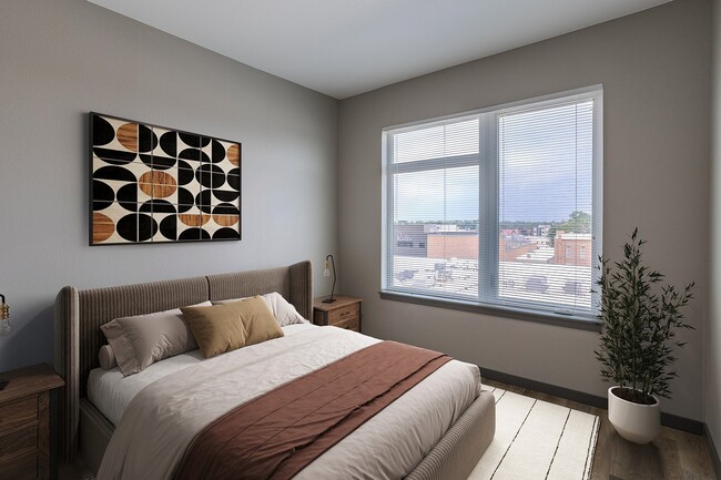 Spacious Bedroom with Natural Light - Patina Flats at the Foundry Apartments