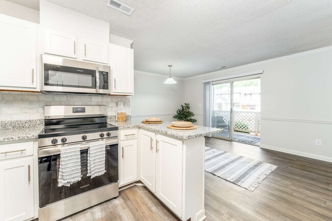 Explore apartments for rent in Winston-Salem, NC at Sugar Creek Apartments with upgraded kitchens, spacious layouts, and private balconies designed for comfortable living. - Sugar Creek Apartments