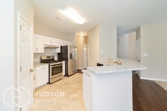 Building Photo - Move in by July 31st - GET 2nd MONTH FREE!