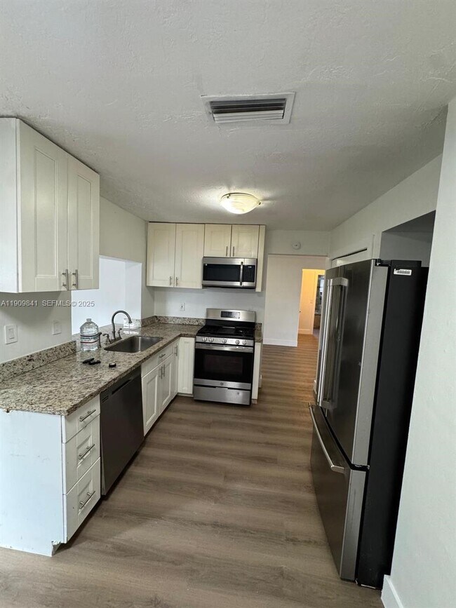 Building Photo - 8670 NW 28th Pl