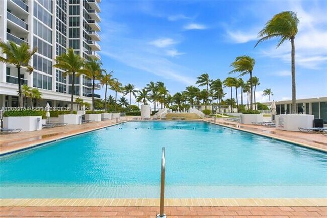 Building Photo - 10275 Collins Ave