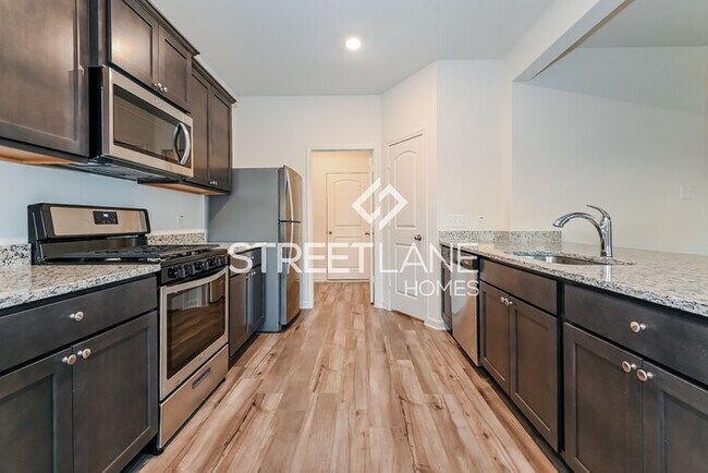 Building Photo - Charming Four Bedroom, Two and Half Bath i...
