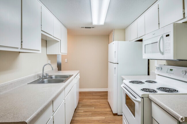 2BR, 1BA - 855SF - Cocina - Acacia Apartments