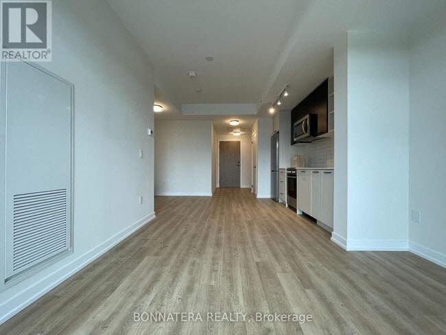 Building Photo - 2306-2306 St Clair Ave W