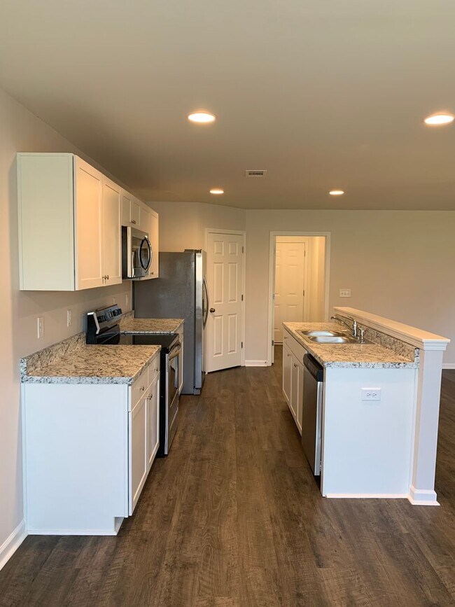 Building Photo - *Preleasing* NEW Four Bedroom | Two Bathro...
