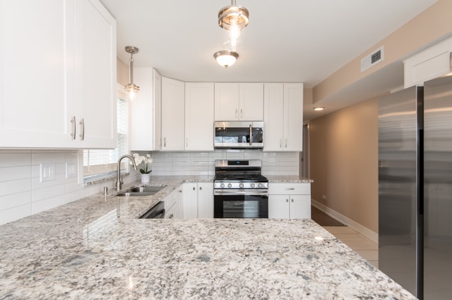 Photo - 8729 W 73rd Pl Apartment