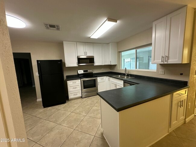 Foto del edificio - 4639 W Ruth Ave