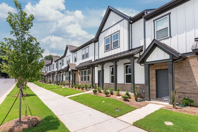 Building Photo - Welcome home to this stunning brand-new townhome in one of Indian Trail's newest and most desirab...