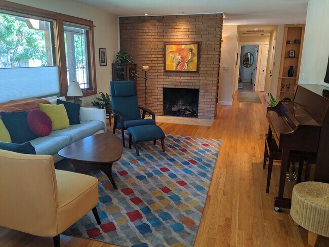 Main living room with wood burning fireplace - 2098 E Floyd Pl
