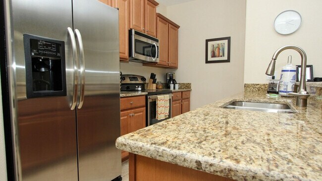 Foto del edificio - 8980 Majesty Palm Rd