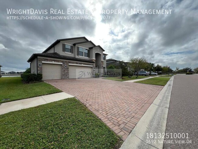 Foto del edificio - Stunning 5/5 pool home in Long Lake Ranch!